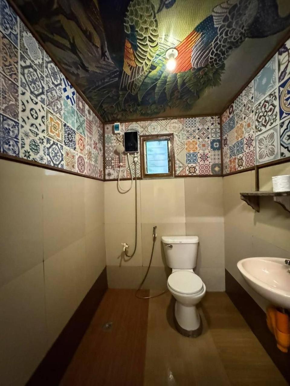 Aquaholik Traveler'S Lodge เอลนิโด ภายนอก รูปภาพ